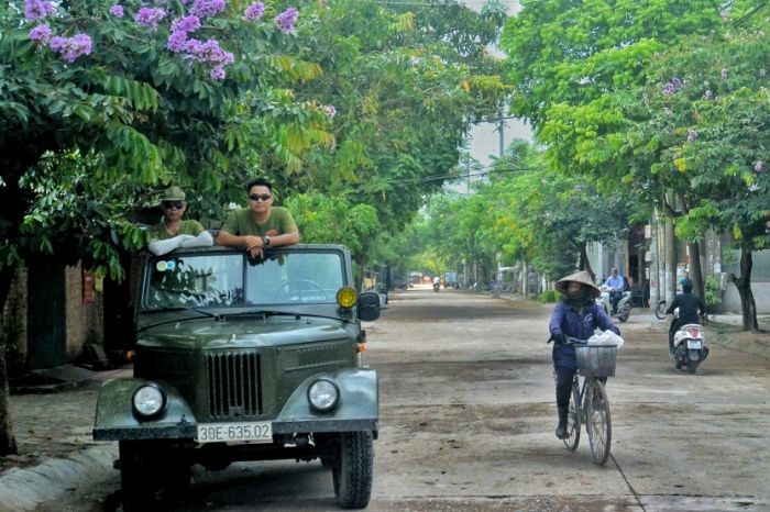 Hanoi outskirt with jeep car